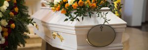 coffin with flowers