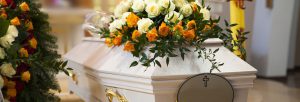 coffin with flowers